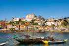 Rabelo boats near the Luis I Bridge over the Douro River, Porto, Portugal. Art Print
